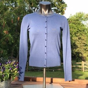Sarah Johnson S Blue button up Sweater.